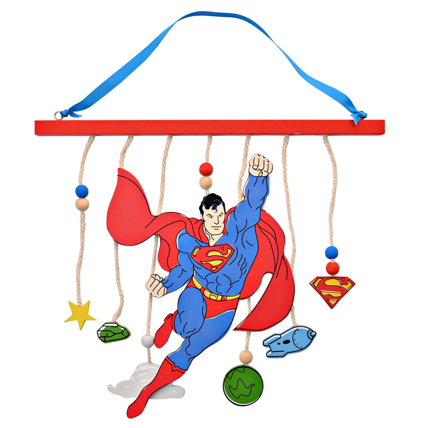 The wall art stands out with a large image of Superman mid-flight, which hangs from a red, matt finish rectangular plaque by its blue hanger. It is furthered by additional decorations – including star, cloud, Superman logo, planet, rocket ship and kryptonite - all of which hang around the Man of Steel.